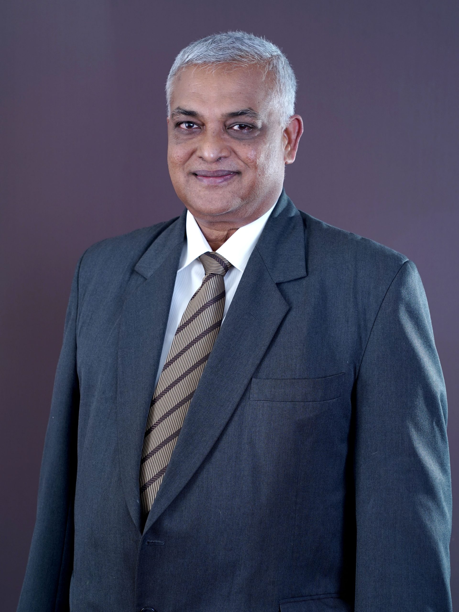 Dr. Dinesh Arunatileka